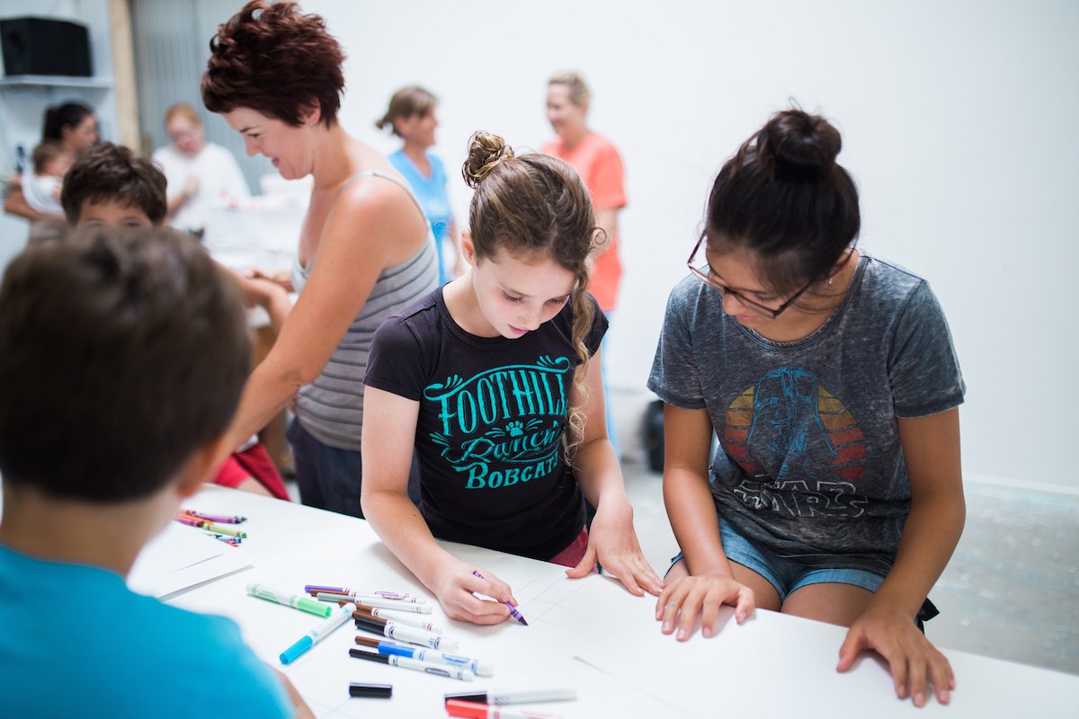 Workshop Attendees Sketch and Collaborate at HeARTfelt Play Studio in Costa Mesa, California